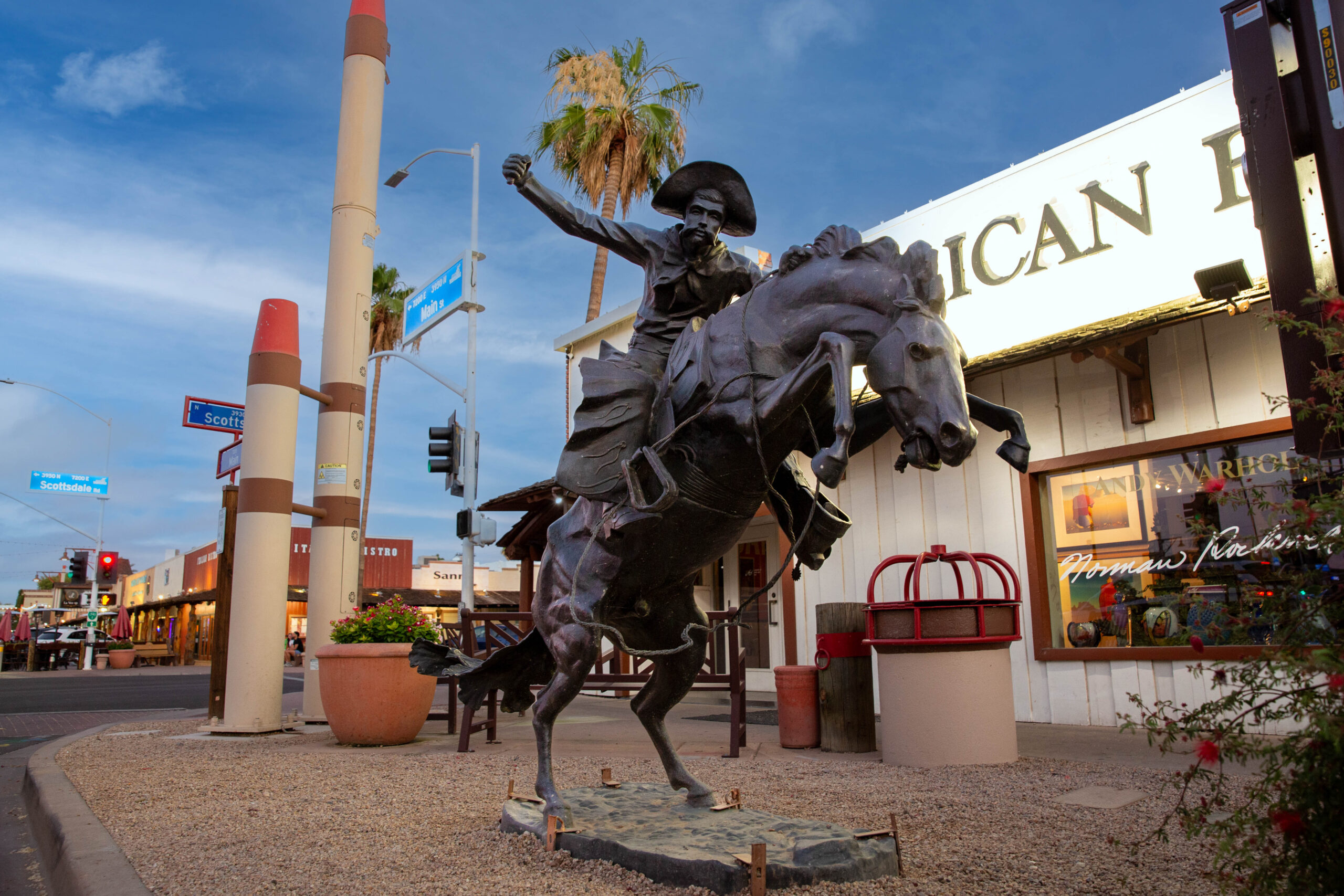 Pario_Bishop_lifestyle_4 - A statue of a man riding a horse